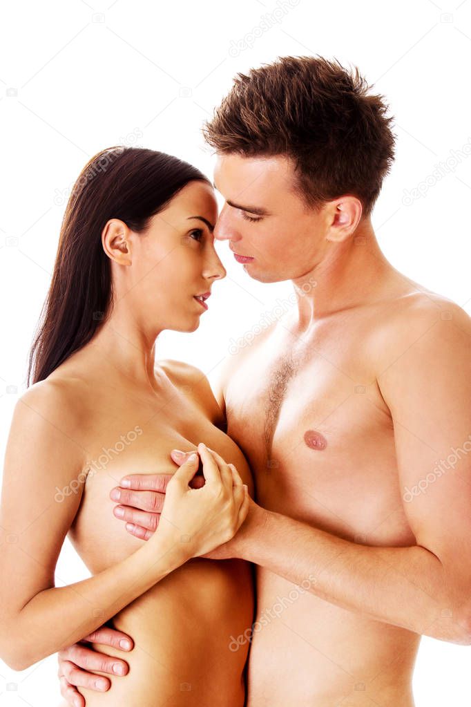 Man covering womans breast, isolated.