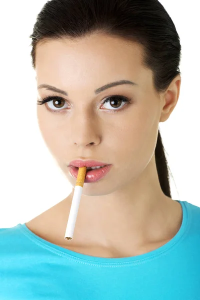 Young beautiful woman holding cigarette. — Stock Photo, Image