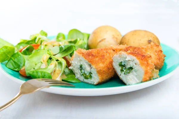 Kiev cutlet with jacket potatoes and salad — Stock Photo, Image