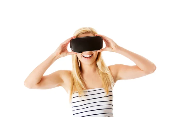 Girl wearing virtual reality goggles isolated on white. — Stock Photo, Image