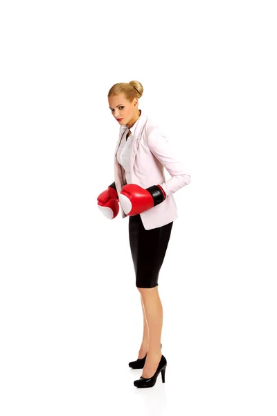 Business woman in red boxing gloves — Stock Photo, Image