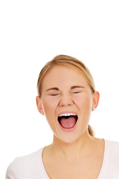 Stressed or angry young woman screaming — Stock Photo, Image