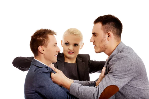 Businessmen getting into a fight woman trying to separate them — Stock Photo, Image