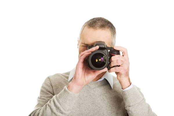 Mature man with photo camera — Stock Photo, Image