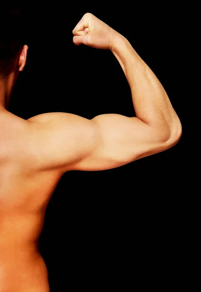 Vista posteriore del giovane uomo muscoloso — Foto Stock