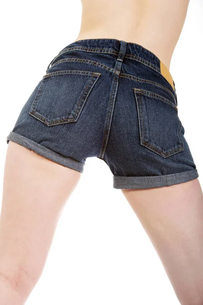 Shirtless woman in jeans shorts. — Stock Photo, Image
