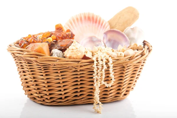 Willow basket with souvenirs from holiday — Stock Photo, Image