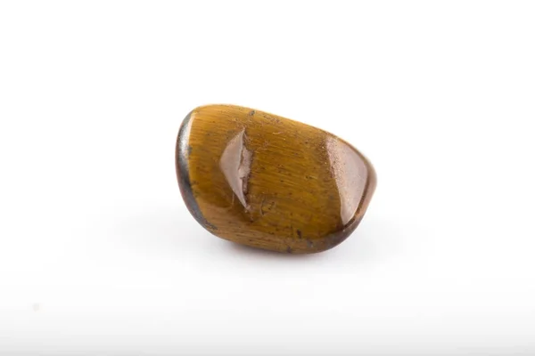 Tiger eye gem on white background — Stock Photo, Image