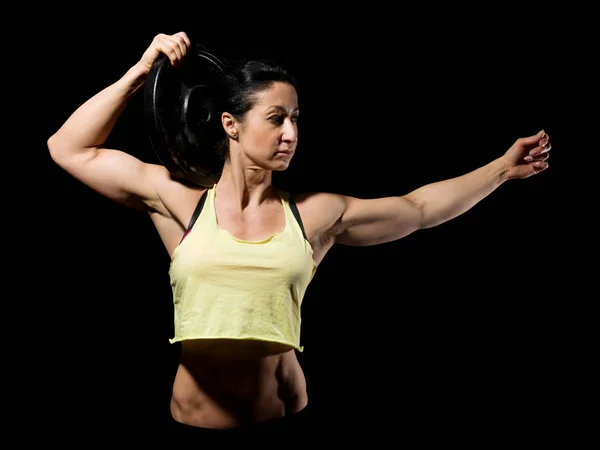 Muscular bodybuilder woman showing her muscles. — Stock Photo, Image