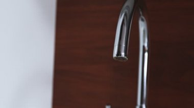 Dripping tap with water