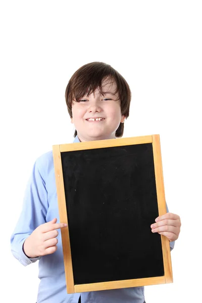 Happy schoolboy  holding a blackboard — Stock Photo, Image