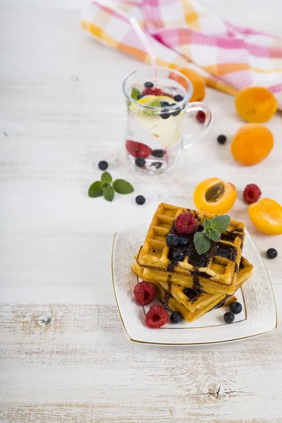 Delicious waffle with berries and chocolate — Stock Photo, Image