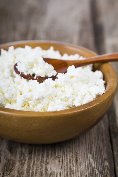 Cottage cheese and spoon — Stock Photo, Image