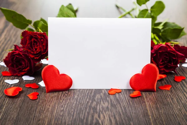 Red roses and card — Stock Photo, Image