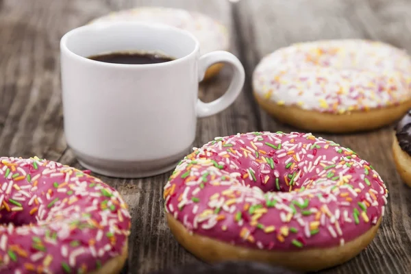 Donuts et une tasse de café c — Photo