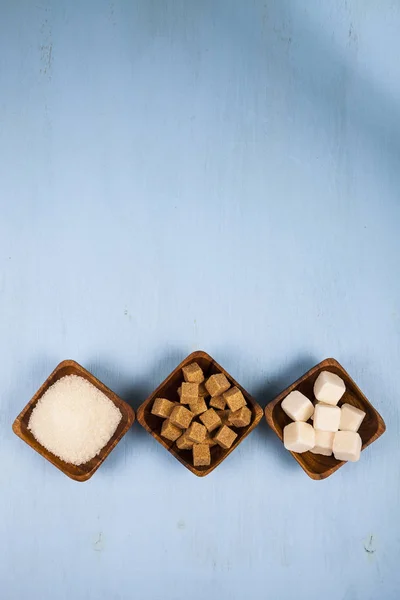 Three bowls of sugar, top view — Stock Photo, Image