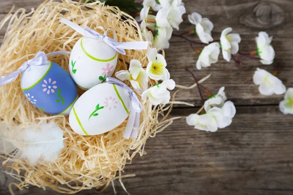 Easter eggs in nest — Stock Photo, Image