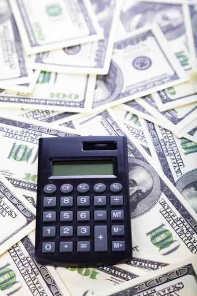 Calculator on dollars. — Stock Photo, Image