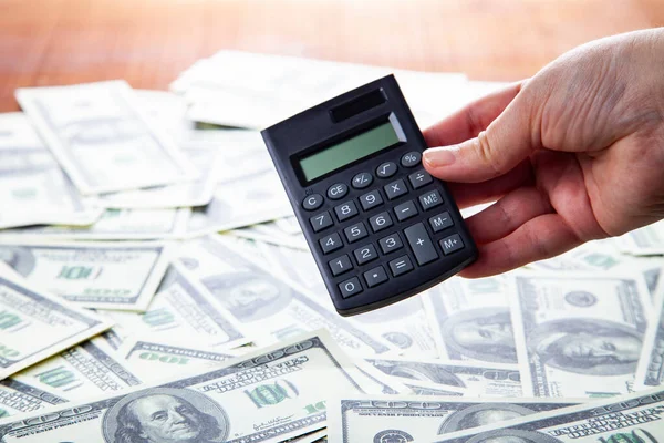 Calcolatrice Mano Uno Sfondo Dollari Affari Finanza — Foto Stock