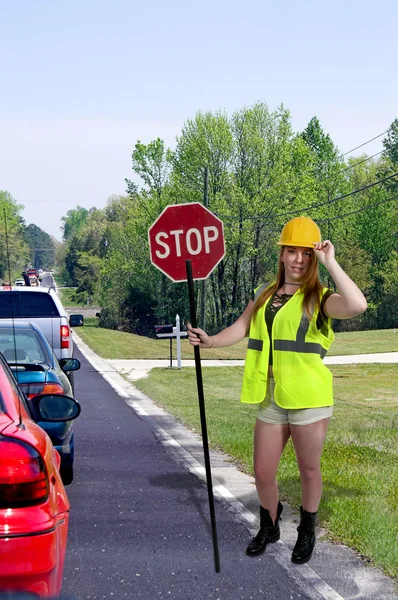 Trabalhador com sinal de parada — Fotografia de Stock