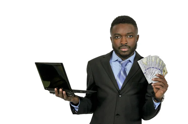 Man with computer and cash — Stock Photo, Image