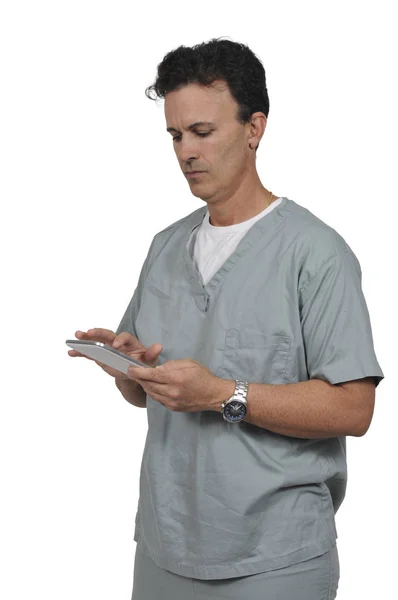 Médico usando um comprimido — Fotografia de Stock