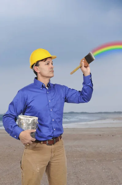 Homem pintando um arco-íris — Fotografia de Stock