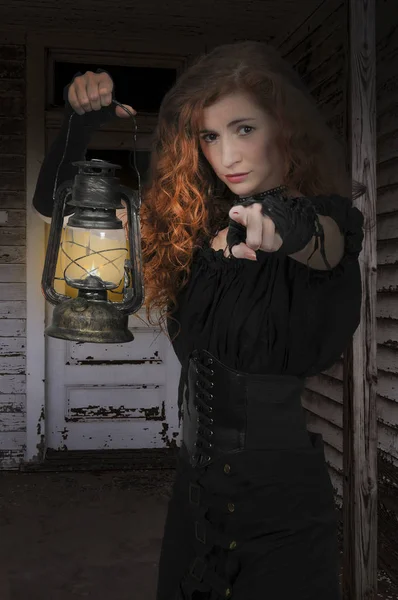 Woman holding lantern — Stock Photo, Image