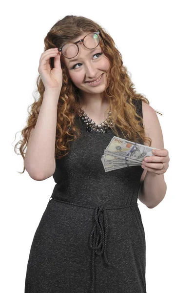 Жінка тримає 100-доларових купюр — стокове фото