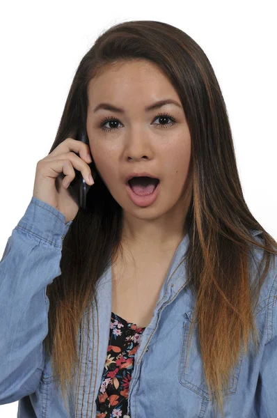 Adolescente en un teléfono celular — Foto de Stock