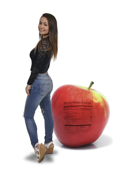 Aziatische tiener vrouw en apple — Stockfoto