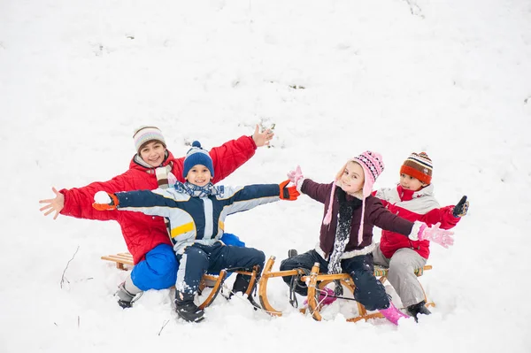 Feliz Niño Juguetón Trineo Nieve Fotos de stock