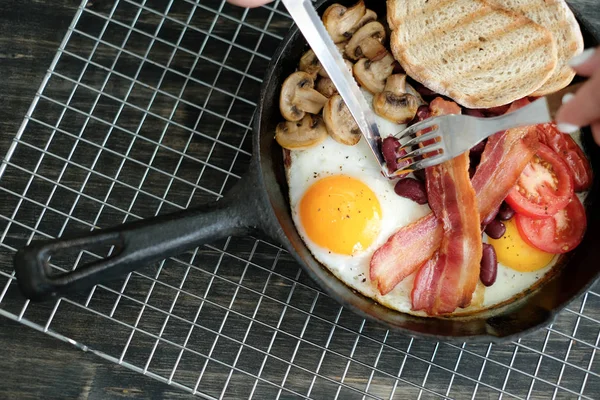 Food and cuisine, English breakfast in frying pan: eggs, bacon, mushrooms, tomatoes, beans and bread
