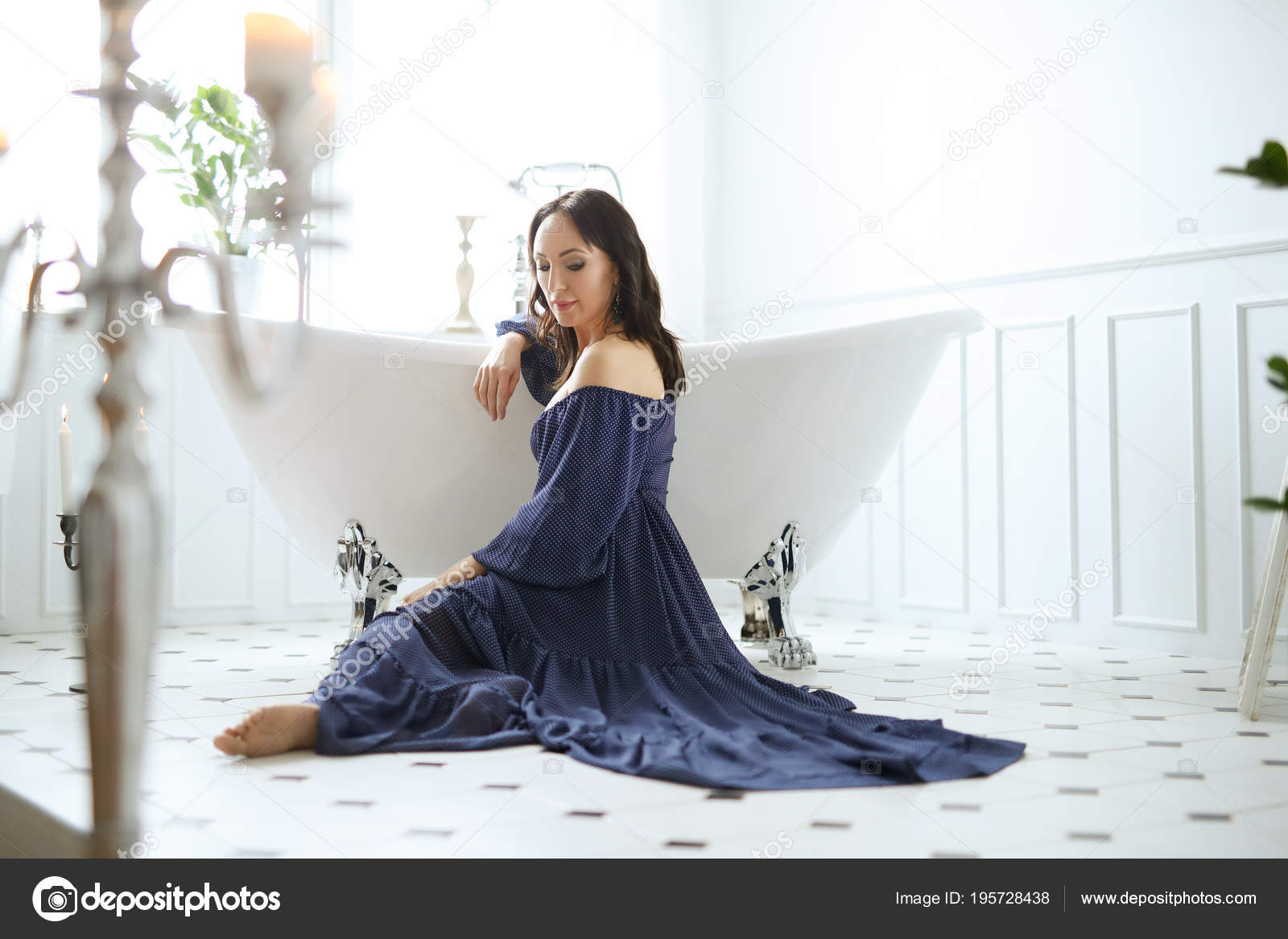 Woman in Dress Sitting On Floor