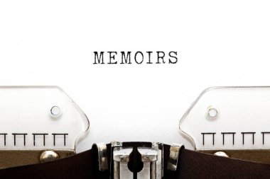 Word Memoirs Typed On Retro Typewriter clipart