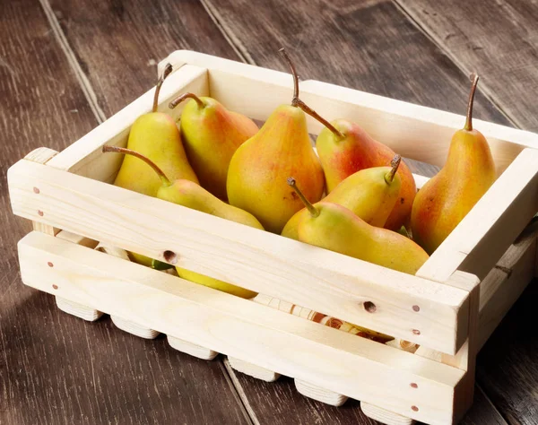 Wooden crate with pears