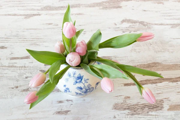 Pink tulips in a vase — Stock Photo, Image