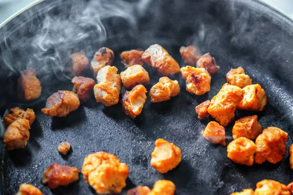 stock image Soy meat being fried on frying pan with smoke