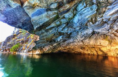 Grotto in marble quarry in Ruskeala Park (Republic of Karelia, Russia) clipart