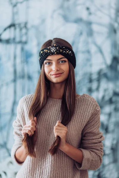 young  woman in warm headband