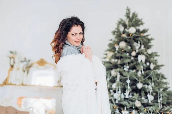 Happy woman in Christmas decorations — Stock Photo, Image