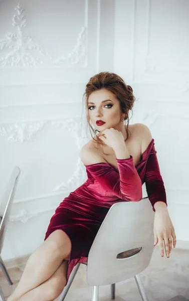 Beautiful  young  woman in velvet dress — Stock Photo, Image