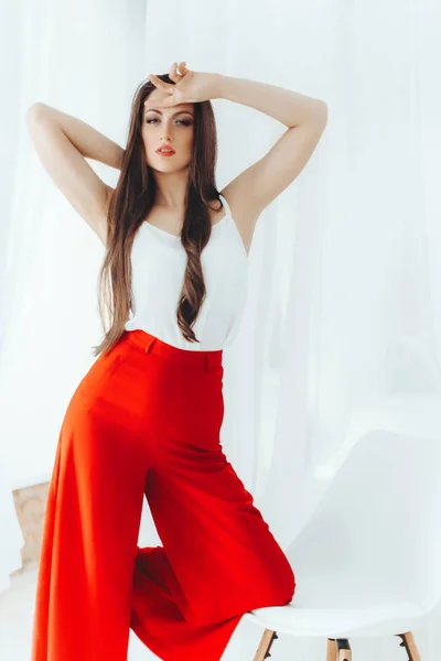 Young   woman in  red pants — Stock Photo, Image