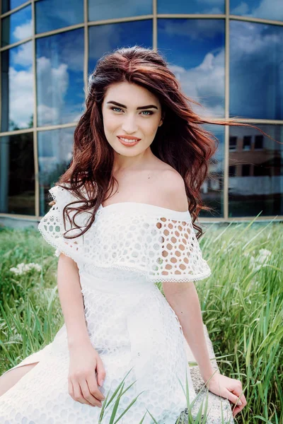 Young woman   posing in white dress — Stock Photo, Image