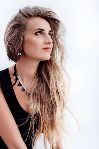 Young woman   posing in black clothes — Stock Photo, Image