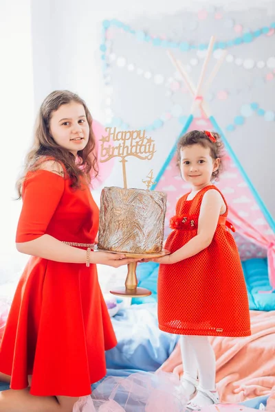 Mother and  baby girl posing at party — Stock Photo, Image