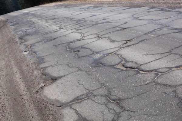 Bad road with cracks — Stock Photo, Image