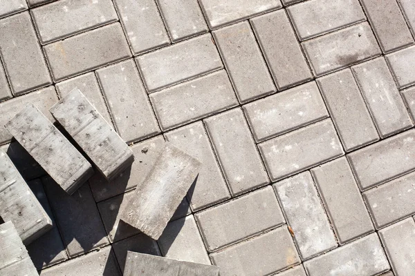 Şehirde döşeme döşemesi. Kaldırımın onarımı