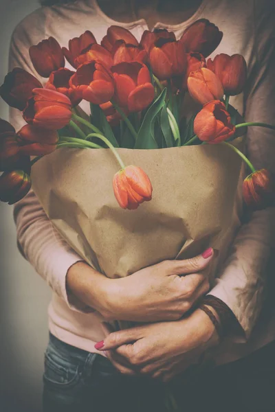 Girl and tulips — Stock Photo, Image