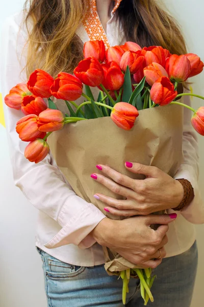 Girl and tulips — Stock Photo, Image